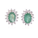 Earrings with emeralds and diamonds early 21st century.