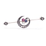 Brooch with diamonds, sapphire and ruby early 20th century.