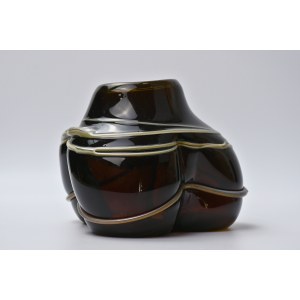 Artistic vase with a braided design