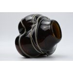 Artistic vase with a braided design