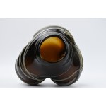 Artistic vase with a braided design