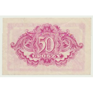 50 grošov z roku 1944, raz zlomená vo vertikálnom smere