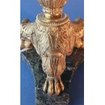 Pair of Empire candlesticks. Gilded bronze. First half of the 19th century. Slight chipping on the marble base.