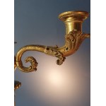 Pair of Empire candlesticks. Gilded bronze. First half of the 19th century. Slight chipping on the marble base.