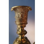 Pair of Empire candlesticks. Gilded bronze. First half of the 19th century. Slight chipping on the marble base.