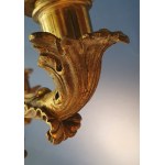 Pair of Empire candlesticks. Gilded bronze. First half of the 19th century. Slight chipping on the marble base.