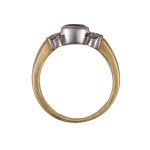 Yellow gold sapphire ring with a natural sapphire and diamonds