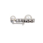 Gold pendant with natural diamonds (rare white diamonds, 0.74 ct) and an Akoya sea pearl—certified
