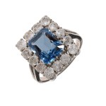 Gold ring with natural diamonds and a blue spinel (a rare white variety) — certified
