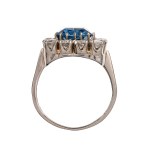 Gold ring with natural diamonds and a blue spinel (a rare white variety) — certified