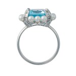 Gold ring with a 6.50 ct natural topaz, natural diamonds, and pearls