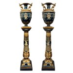 A Pair of Vases on Pedestals