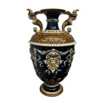 A Pair of Vases on Pedestals