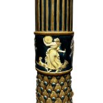 A Pair of Vases on Pedestals