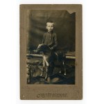 Vilnius, photo by Ch. Łanc, a boy on a rocking horse, office collection (122)