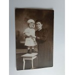 A WOMAN WITH A CHILD