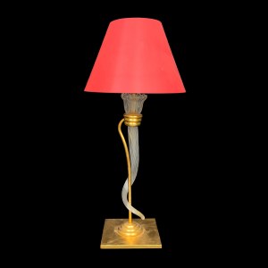 Table lamp made of glass and gold-colored metal