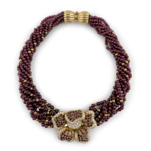 Eight-strand twisted garnet necklace with a flower-shaped 18-karat yellow gold clasp