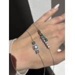 A 2.06-gram gold bracelet with 11 lab-grown diamonds totaling 2.16 ct. Certified by the world
