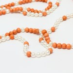 A unique gold necklace made of natural coral and Akoya pearls