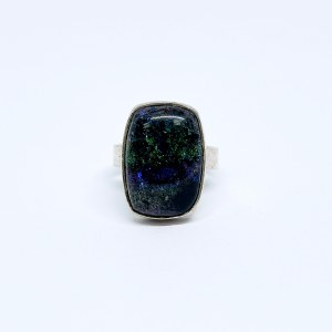 Silver ring with a black Solid opal