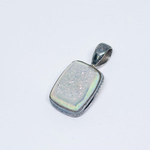 Silver pendant with oxidized quartz