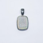 Silver pendant with oxidized quartz