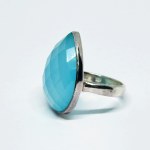 Silver ring with a teardrop-shaped blue chalcedony