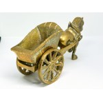 A brass figurine depicting a horse and cart