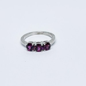 Silver ring with pink topaz