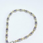 Silver bracelet with purple stones