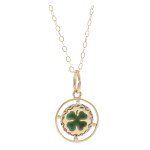 A four-leaf clover pendant with a chain, mid-20th century
