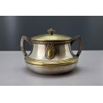 A collectible silver-plated sugar bowl from the turn of the 19th and 20th centuries.