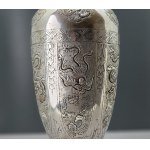 Antique silver-plated vase—“Phoenix and Dragon”—hand-engraved and repoussé—from the turn of the 19th and 20th centuries.