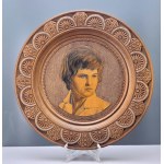 Wooden Hutsul plate with a portrait of a woman, signed in Cyrillic—Eastern Carpathians, first half of the 20th century [HUTSUL REGION]