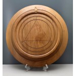 Wooden Hutsul plate with a portrait of a woman, signed in Cyrillic—Eastern Carpathians, first half of the 20th century [HUTSUL REGION]