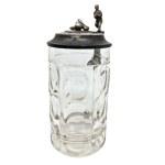 Faceted glass mug with a pewter lid featuring a bowling motif