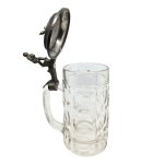 Faceted glass mug with a pewter lid featuring a bowling motif
