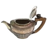 A silver-plated teapot by Roberts &amp; Belk, England