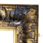 A gilded frame with a flowing oak-leaf ornament