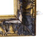 A gilded frame with a flowing oak-leaf ornament