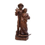 Wooden figurine of a Tyrolean couple with a console table