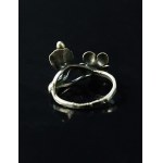 Ring with a floral motif, marked T.H. (175)