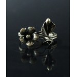 Ring with a floral motif, marked T.H. (175)