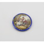A powder compact featuring a genre scene in the Rococo style
