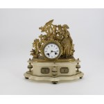 Fireplace clock with a shepherdess figurine