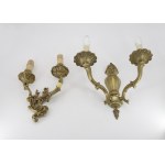 A pair of matching wall sconces