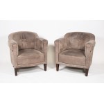 A pair of club chairs