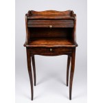 An elegant walnut center desk featuring a top with a sliding cylinder lock