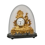 Table clock with a female figure under a glass dome - 19th century
